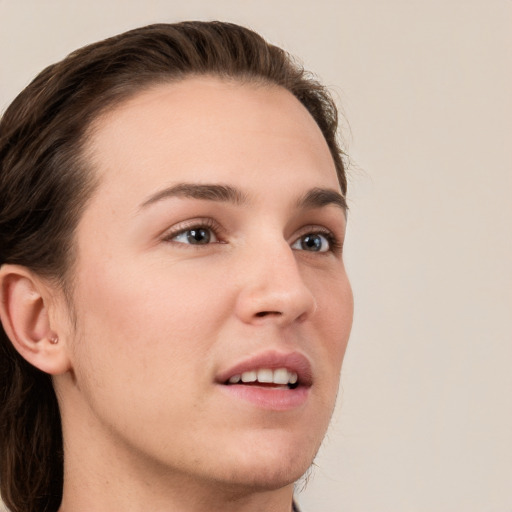 Neutral white young-adult female with medium  brown hair and grey eyes