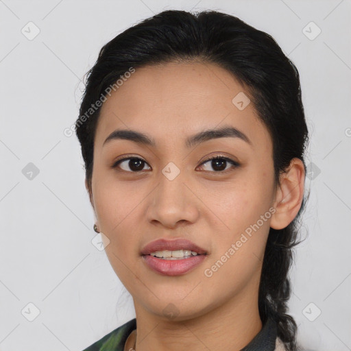 Joyful asian young-adult female with medium  black hair and brown eyes