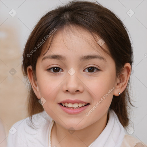 Joyful white child female with medium  brown hair and brown eyes