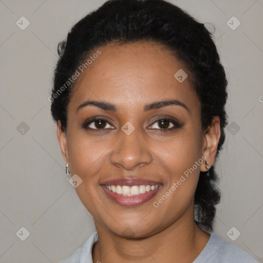 Joyful black young-adult female with medium  black hair and brown eyes