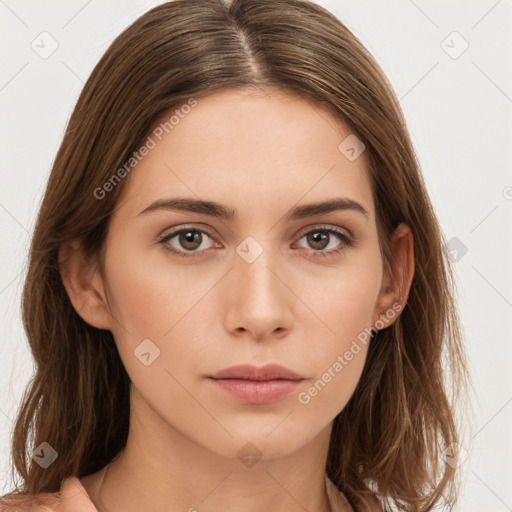 Neutral white young-adult female with long  brown hair and brown eyes