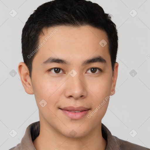 Joyful white young-adult male with short  black hair and brown eyes