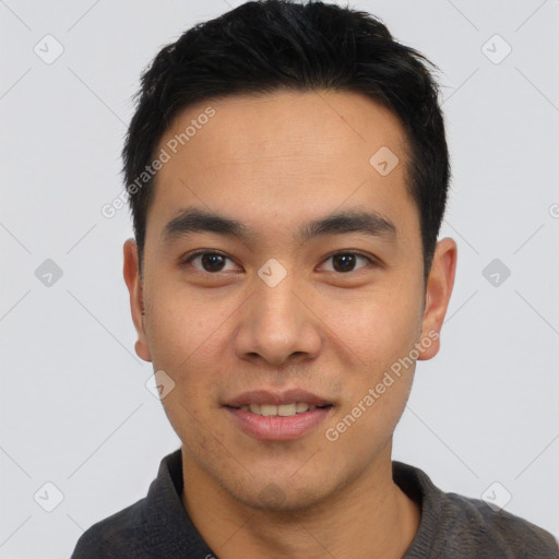 Joyful white young-adult male with short  black hair and brown eyes