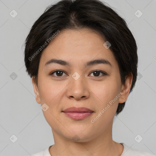 Joyful asian young-adult female with short  brown hair and brown eyes