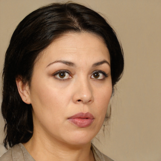 Neutral white adult female with medium  brown hair and brown eyes