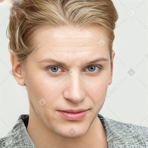 Joyful white young-adult female with short  brown hair and blue eyes