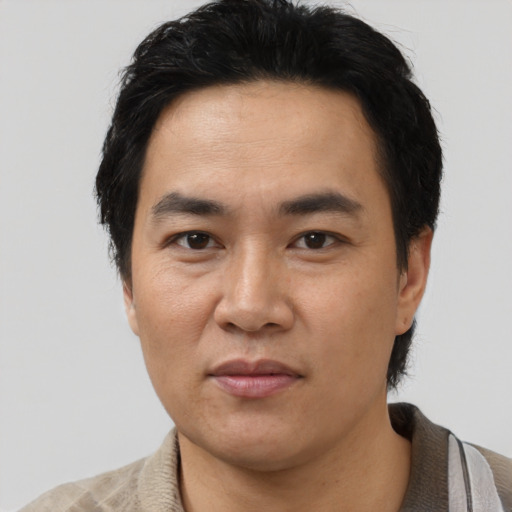 Neutral asian young-adult male with short  black hair and brown eyes