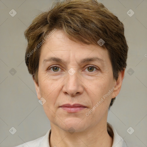 Joyful white adult female with short  brown hair and brown eyes