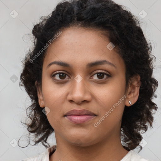 Joyful black young-adult female with medium  brown hair and brown eyes