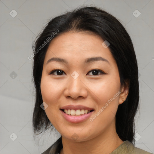 Joyful asian young-adult female with medium  brown hair and brown eyes