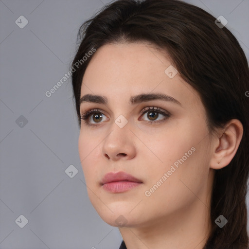 Neutral white young-adult female with medium  brown hair and brown eyes