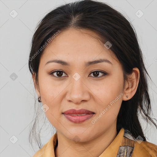 Joyful latino young-adult female with medium  brown hair and brown eyes