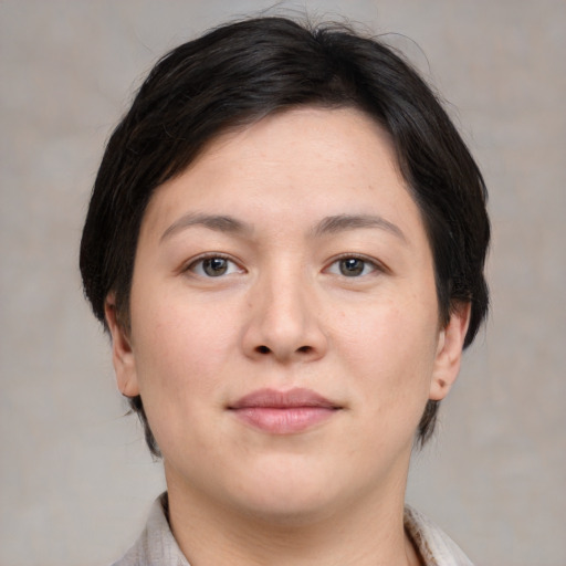 Joyful white young-adult female with medium  brown hair and brown eyes