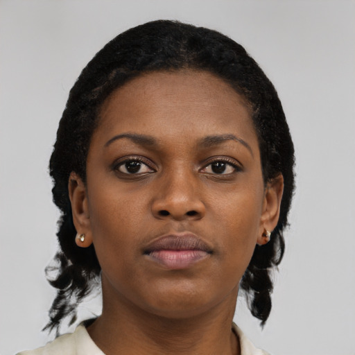 Neutral black young-adult female with short  black hair and brown eyes