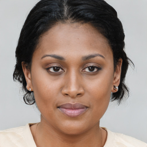 Joyful asian young-adult female with medium  brown hair and brown eyes