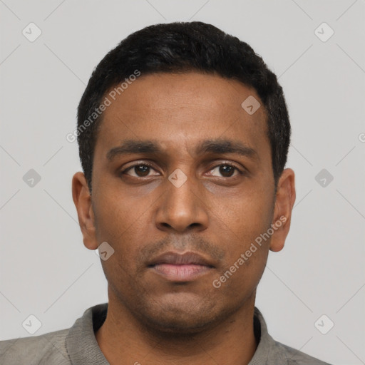Neutral latino young-adult male with short  black hair and brown eyes