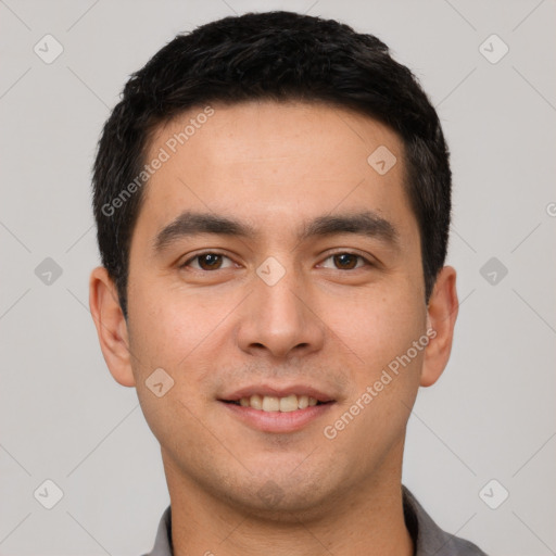 Joyful white young-adult male with short  black hair and brown eyes