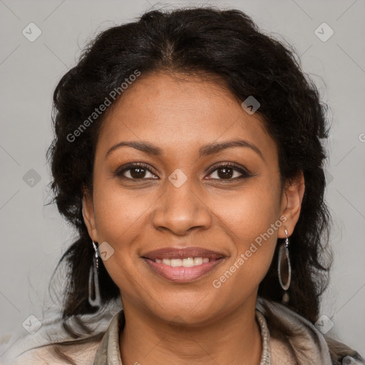 Joyful black adult female with medium  brown hair and brown eyes