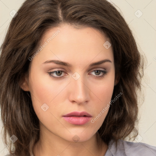 Neutral white young-adult female with medium  brown hair and green eyes