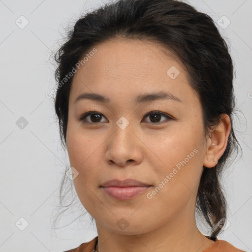 Joyful asian young-adult female with medium  brown hair and brown eyes