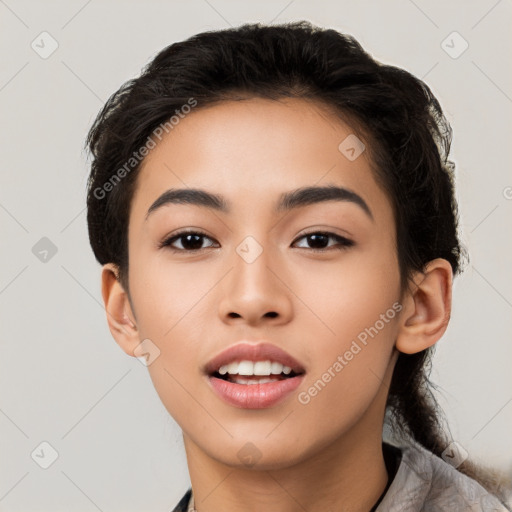 Joyful latino young-adult female with short  black hair and brown eyes