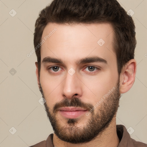 Neutral white young-adult male with short  brown hair and brown eyes