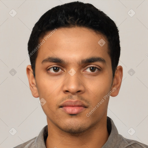 Neutral latino young-adult male with short  black hair and brown eyes