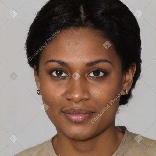 Joyful black young-adult female with short  black hair and brown eyes