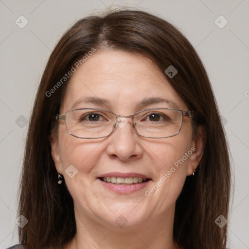 Joyful white adult female with medium  brown hair and brown eyes