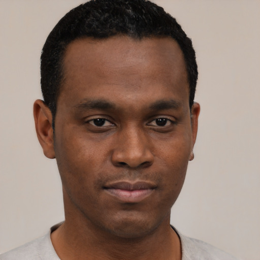 Neutral black young-adult male with short  black hair and brown eyes