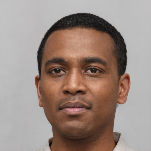 Neutral black young-adult male with short  black hair and brown eyes