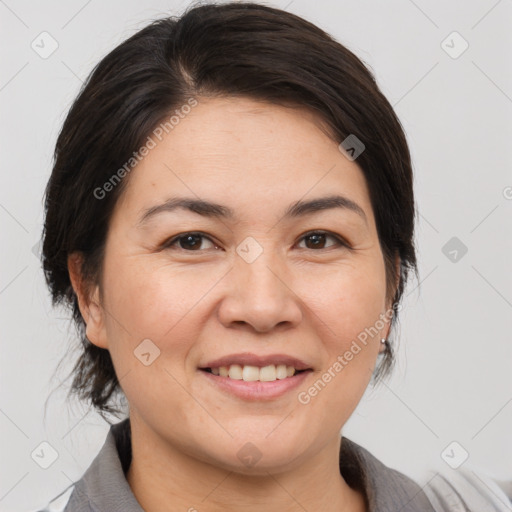 Joyful white adult female with medium  brown hair and brown eyes