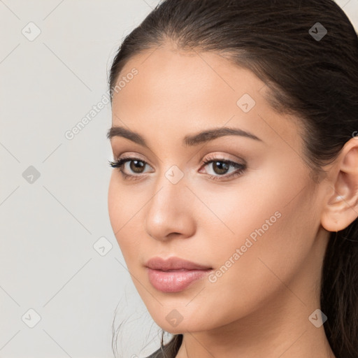 Neutral white young-adult female with long  brown hair and brown eyes