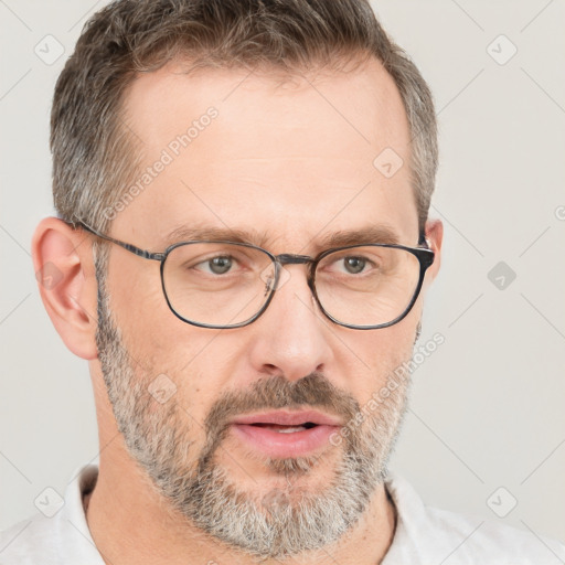 Neutral white adult male with short  brown hair and brown eyes