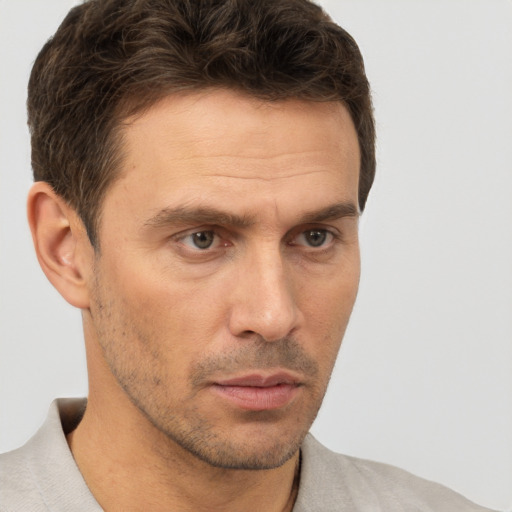 Neutral white adult male with short  brown hair and brown eyes