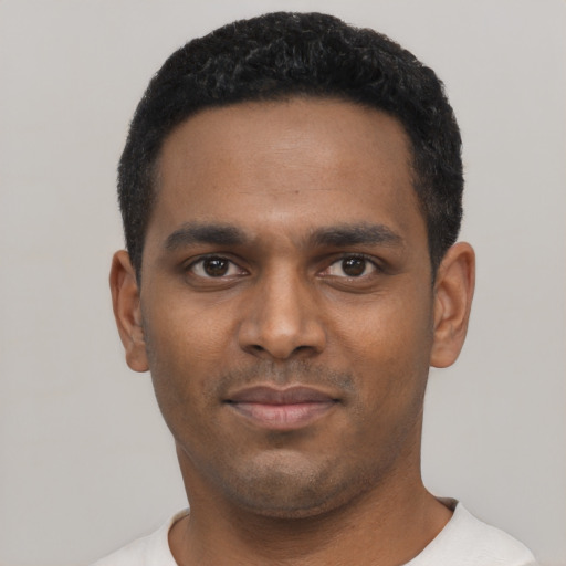 Neutral black young-adult male with short  black hair and brown eyes
