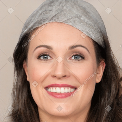 Joyful white young-adult female with long  brown hair and grey eyes