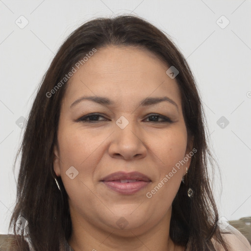 Joyful white adult female with long  brown hair and brown eyes