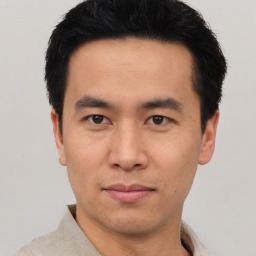 Neutral asian young-adult male with short  black hair and brown eyes