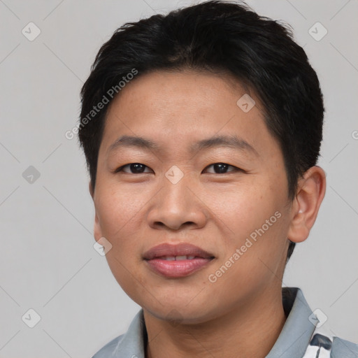 Joyful asian young-adult male with short  brown hair and brown eyes