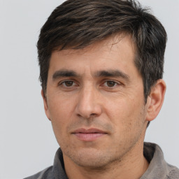 Neutral white adult male with short  brown hair and brown eyes