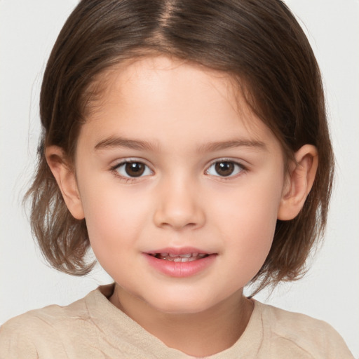 Joyful white child female with medium  brown hair and brown eyes