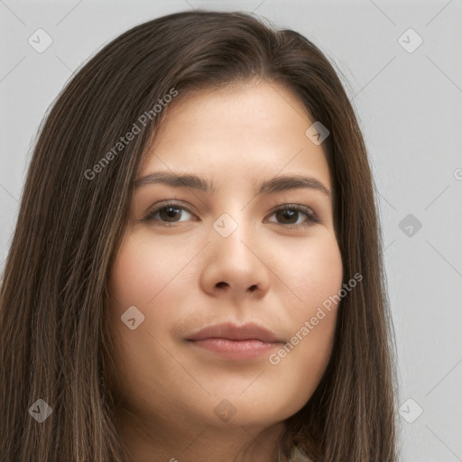 Neutral white young-adult female with long  brown hair and brown eyes