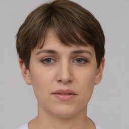 Neutral white young-adult female with short  brown hair and brown eyes