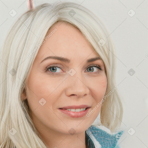 Joyful white young-adult female with long  blond hair and blue eyes