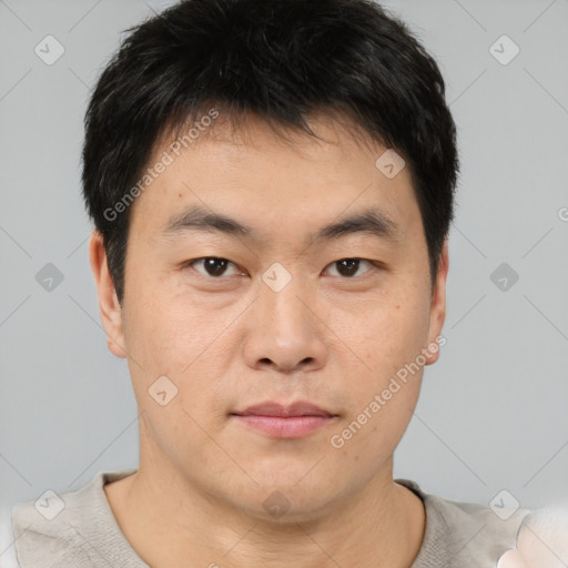 Neutral asian young-adult male with short  brown hair and brown eyes