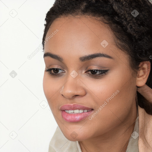 Joyful white young-adult female with long  black hair and brown eyes