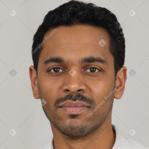 Neutral latino young-adult male with short  black hair and brown eyes
