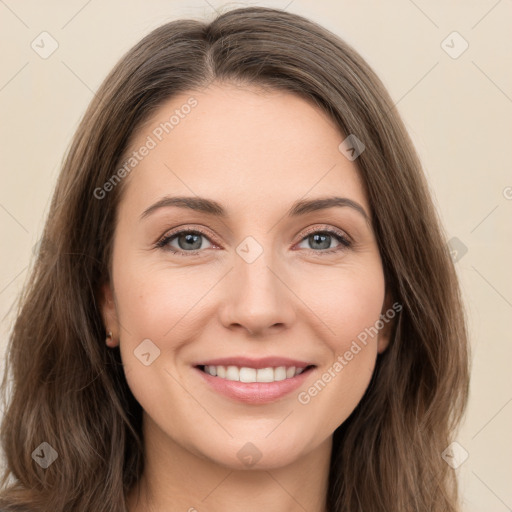 Joyful white young-adult female with long  brown hair and green eyes