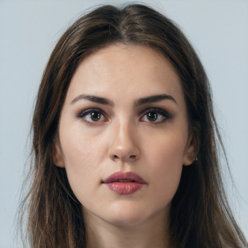 Neutral white young-adult female with long  brown hair and brown eyes